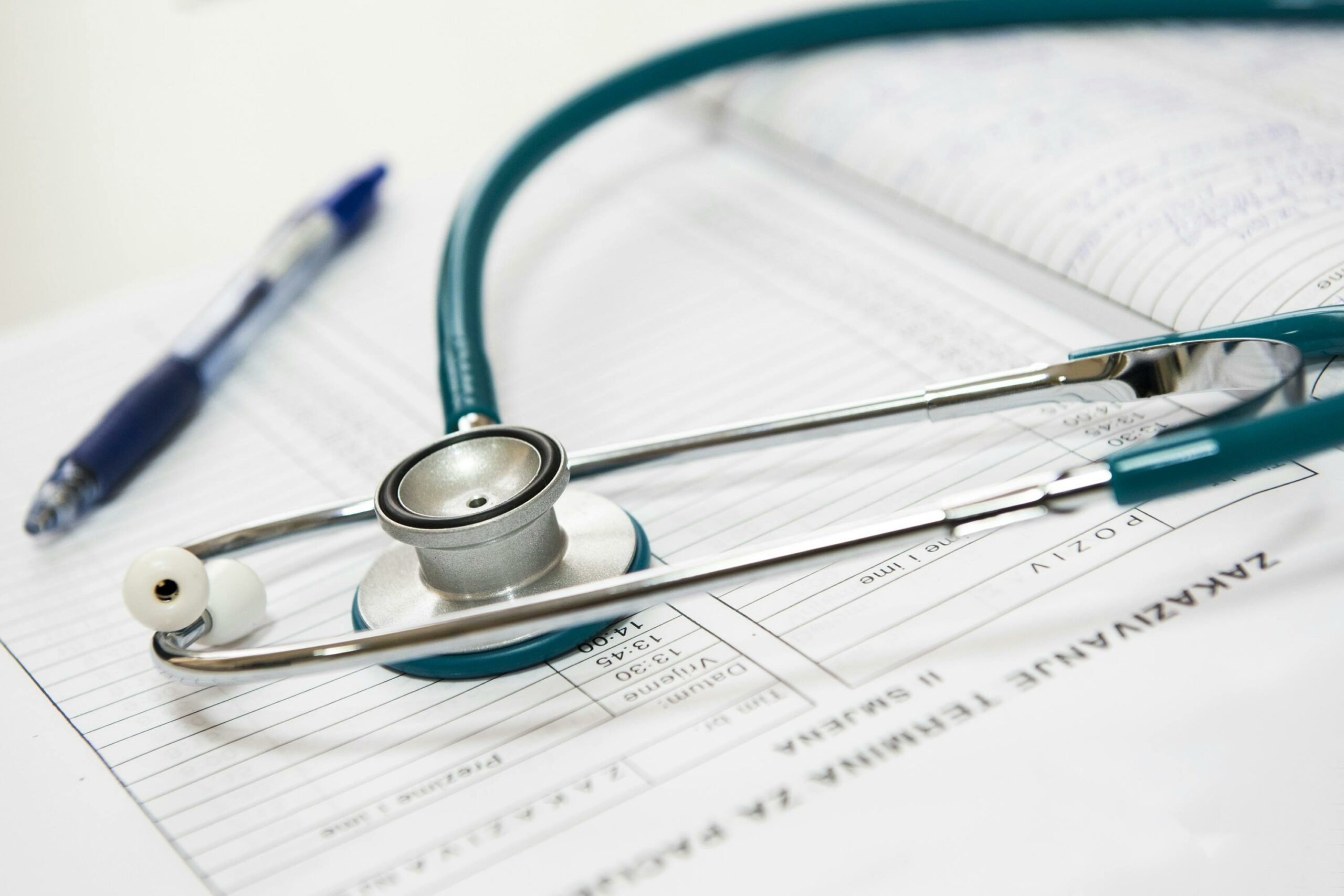 A stethoscope rests on a sheet of paper in the Medical Records and Health Information Office, symbolizing healthcare documentation.