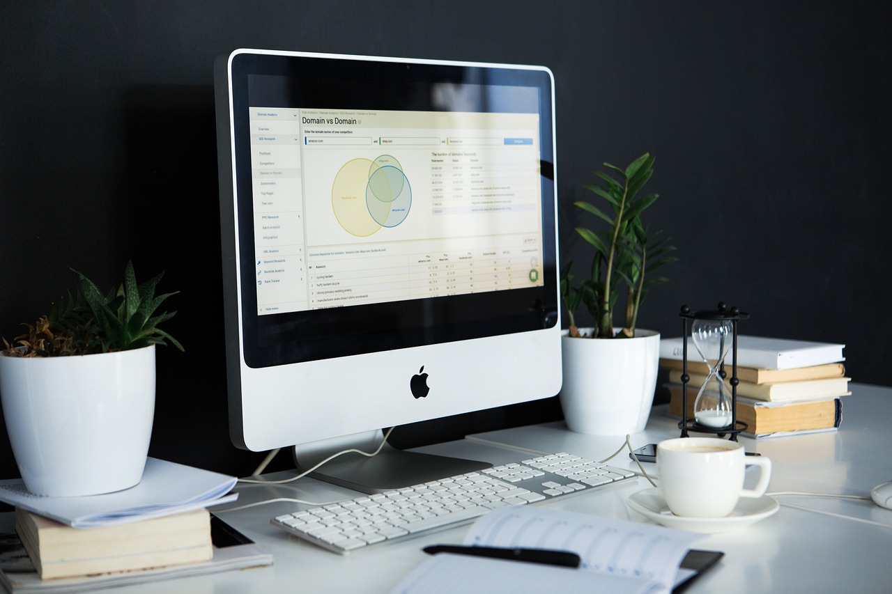 A computer monitor displayed on a desk, symbolizing desktop publishing services and digital workspace efficiency.